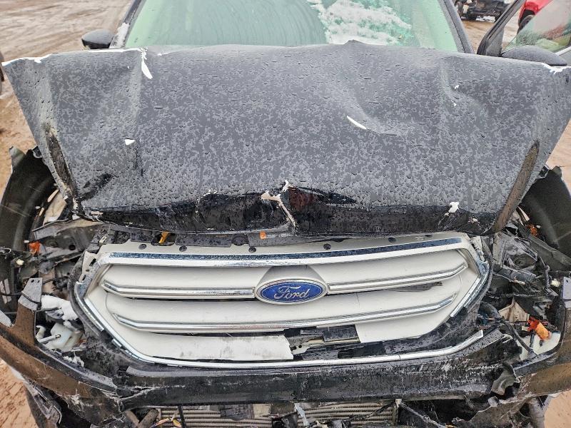Photo 12 from auction – 2018 FORD ESCAPE with VIN 1FMCU9J93JUD45239