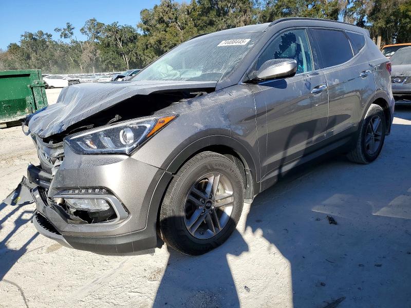 HYUNDAI SANTA FE S 2018 with VIN 5NMZU3LB8JH077520 - Photo from auction