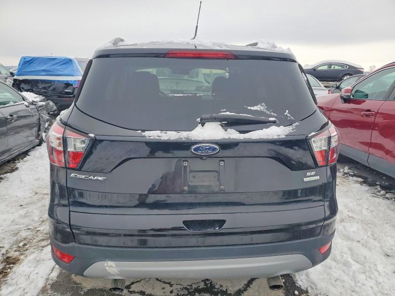 Photo 6 from auction – 2018 FORD ESCAPE SE with VIN 1FMCU0GD5JUB02541