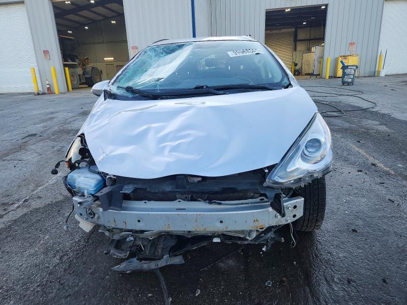 Photo 5 from auction – 2015 TOYOTA PRIUS C with VIN JTDKDTB3XF1586845