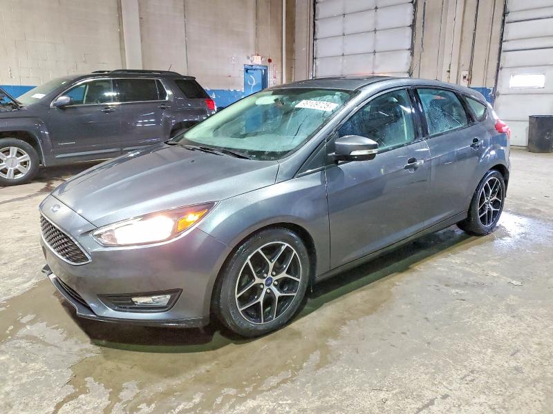 FORD FOCUS 2018 with VIN 1FADP3M21JL310948 - Photo from auction