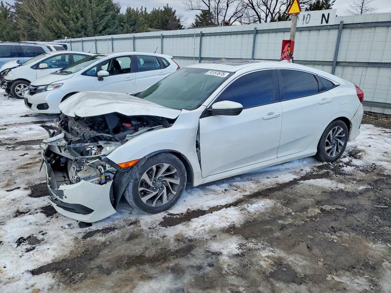 HONDA CIVIC 2018 with VIN 2HGFC2F71JH525911 - Photo from auction
