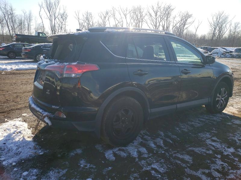 Photo 3 from auction – 2017 TOYOTA RAV4 LE with VIN 2T3BFREV2HW569021
