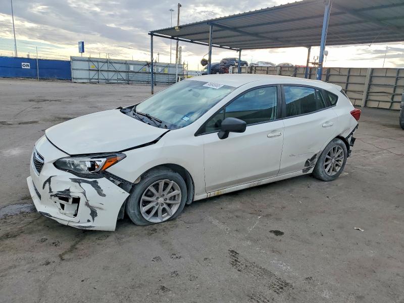 SUBARU IMPREZA 2018 with VIN 4S3GTAA65J3732686 - Photo from auction