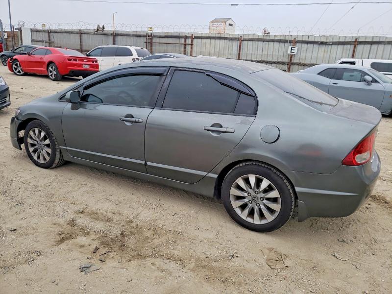 Photo 2 from auction – 2010 HONDA CIVIC EX with VIN 19XFA1F87AE039557