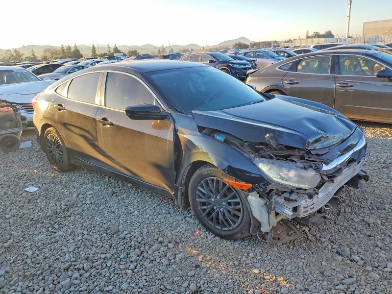 Фото 4 с аукциона – 2017 HONDA CIVIC LX с VIN 2HGFC2F52HH516160
