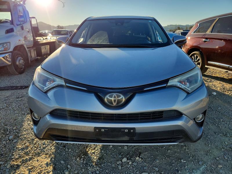 Photo 5 from auction – 2018 TOYOTA RAV4 with VIN JTMWFREV3JD112710