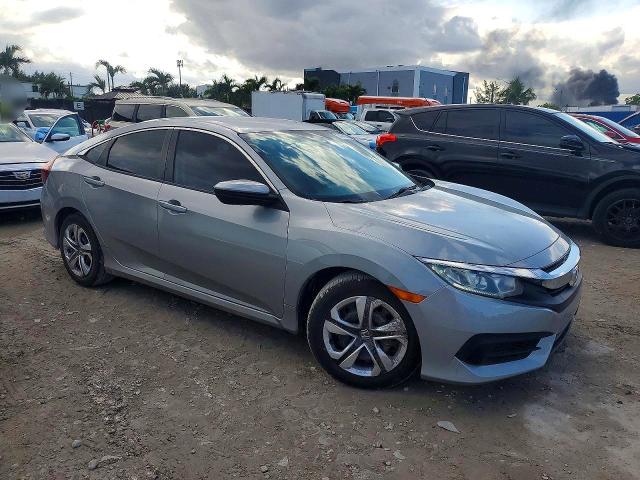 Photo 4 from auction – 2016 HONDA CIVIC LX with VIN 19XFC2F59GE095515