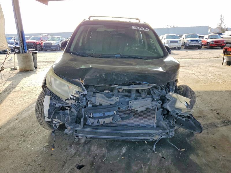 Photo 5 from auction – 2016 HONDA CR-V EXL with VIN 2HKRM3H73GH509656