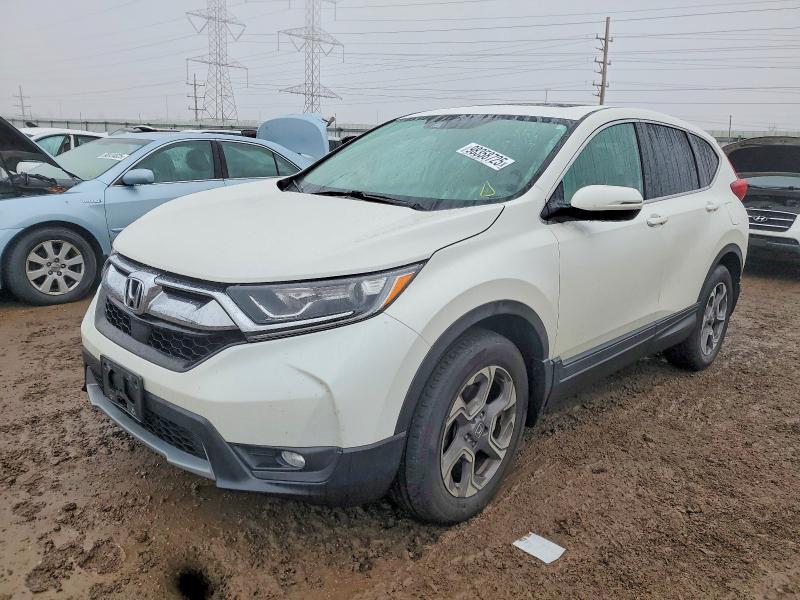 HONDA CR-V EX 2017 with VIN 5J6RW2H57HL043238 - Photo from auction