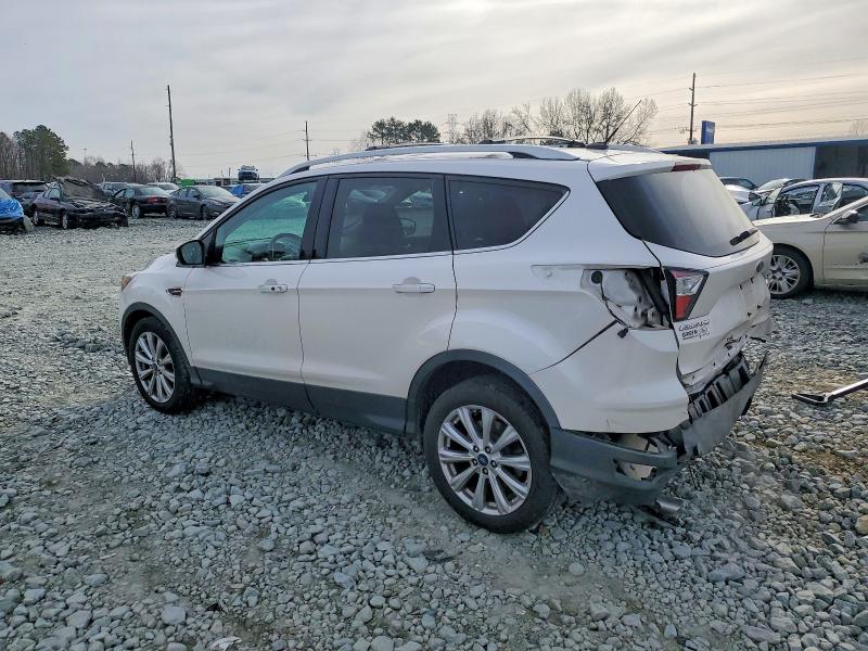 Photo 2 from auction – 2017 FORD ESCAPE TIT with VIN 1FMCU0J92HUD56318
