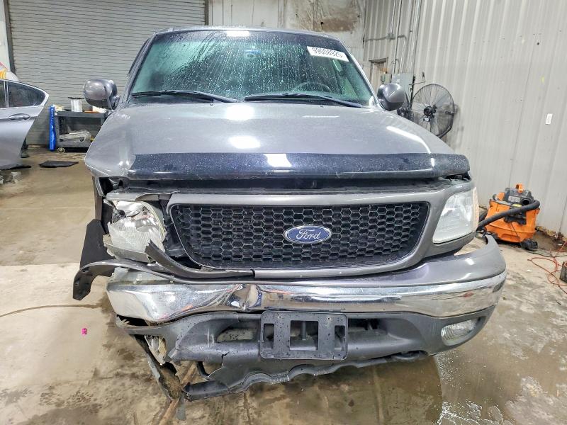 Photo 5 from auction – 2003 FORD F150 with VIN 1FTRX18L63NB43520