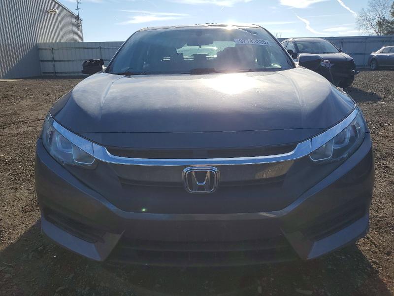 Photo 5 from auction – 2018 HONDA CIVIC EX with VIN 2HGFC2F75JH576344