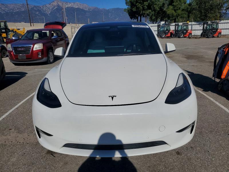 Photo 5 from auction – 2022 TESLA MODEL Y with VIN 7SAYGDEF8NF410172