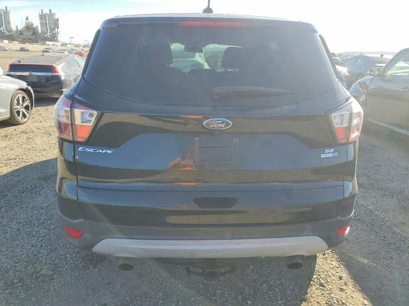 Photo 6 from auction – 2017 FORD ESCAPE with VIN 1FMCU9GD9HUD63220