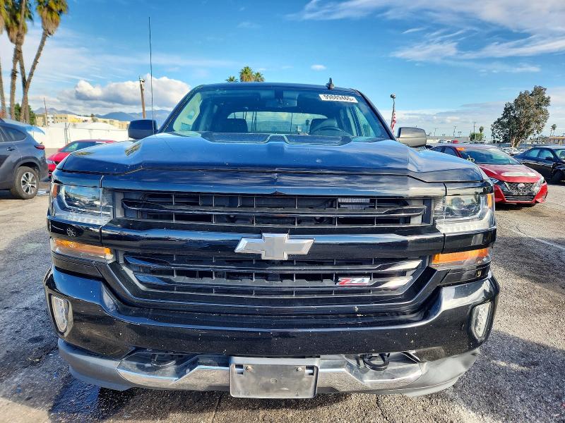 Photo 5 from auction – 2018 CHEVROLET SILVERADO with VIN 3GCUKREC6JG644554