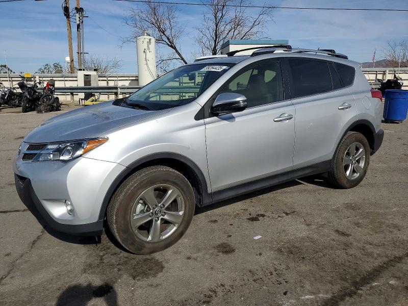 TOYOTA RAV4 XLE 2015 with VIN JTMRFREV8FD117325 - Photo from auction