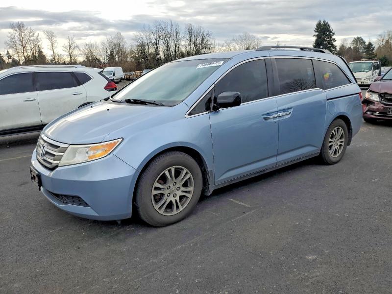 HONDA ODYSSEY 2012 with VIN 5FNRL5H4XCB072137 - Photo from auction
