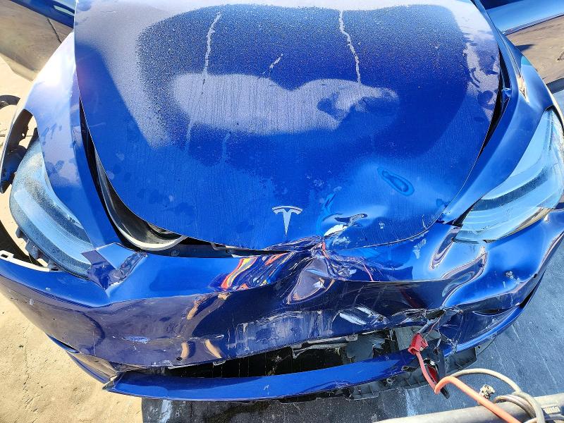 Photo 11 from auction – 2021 TESLA MODEL Y with VIN 5YJYGAED5MF142741