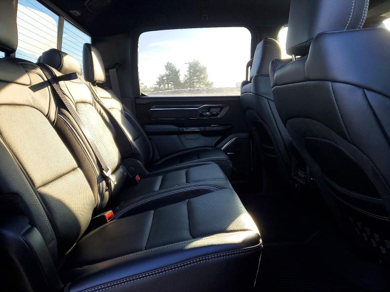 Photo 10 from auction – 2023 RAM 1500 with VIN 1C6SRFU92PN542845
