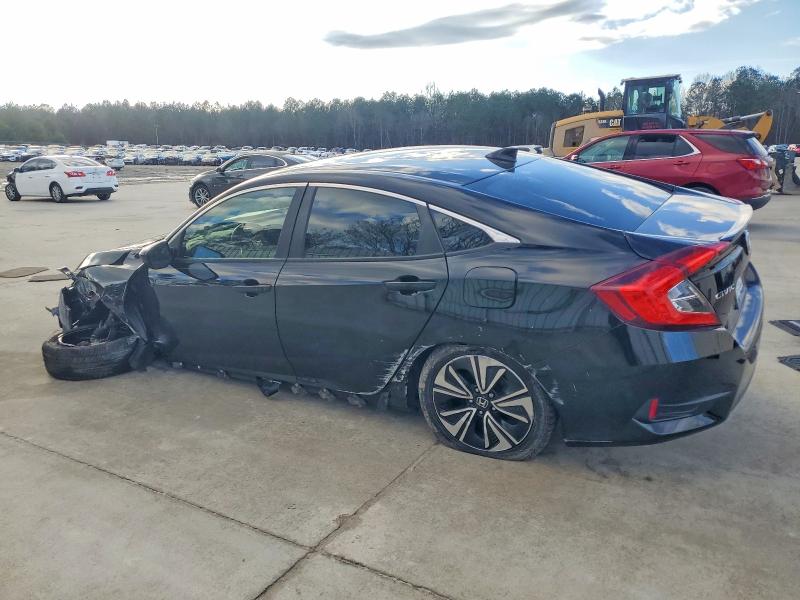 Photo 2 from auction – 2018 HONDA CIVIC EX with VIN JHMFC1F31JX038109