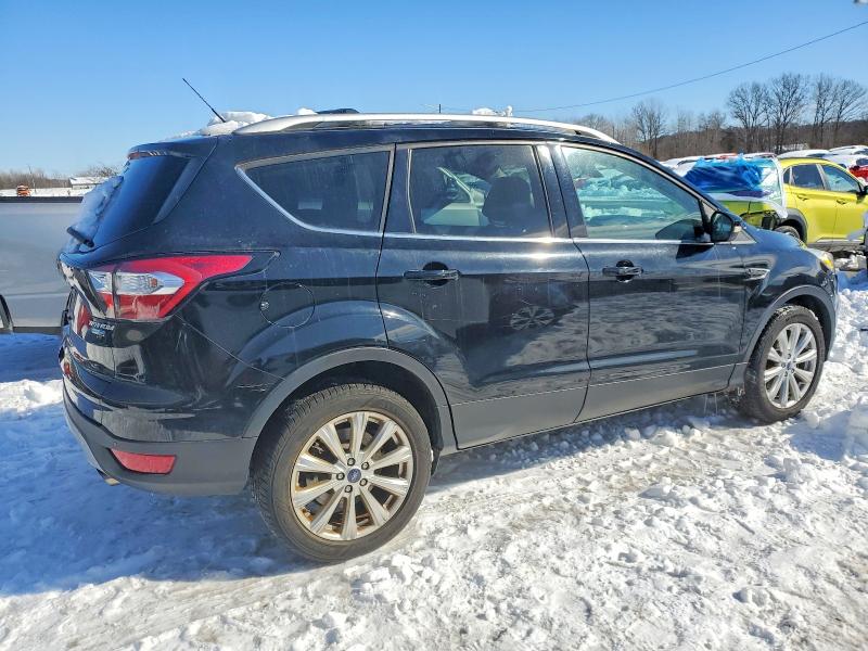 Photo 3 from auction – 2017 FORD ESCAPE TIT with VIN 1FMCU9JD3HUD33221