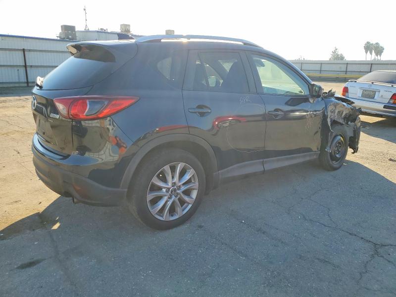 Photo 3 from auction – 2014 MAZDA CX-5 GT with VIN JM3KE4DY1E0424366