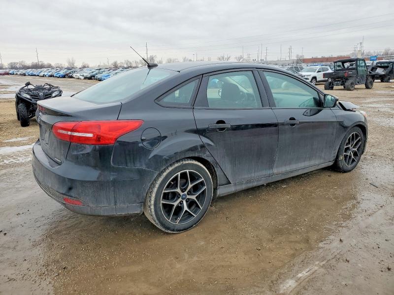 Photo 3 from auction – 2016 FORD FOCUS S with VIN 1FADP3E2XGL236503