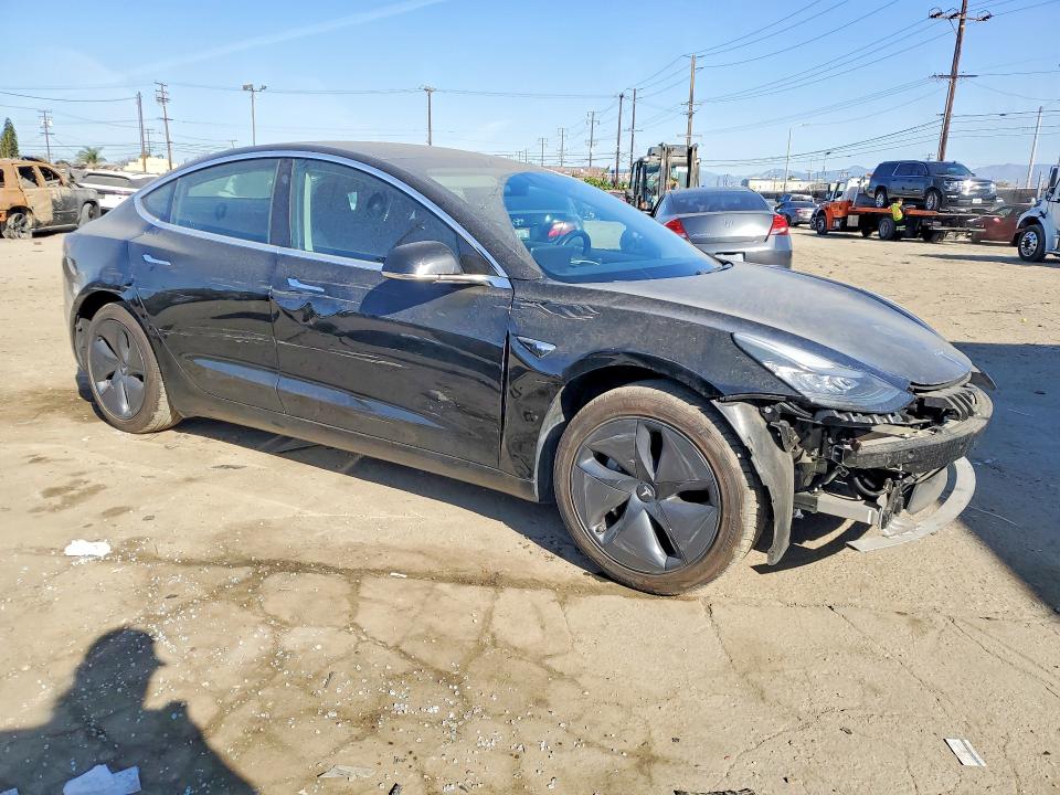 Photo 4 from auction – 2019 TESLA MODEL 3 with VIN 5YJ3E1EA1KF399656