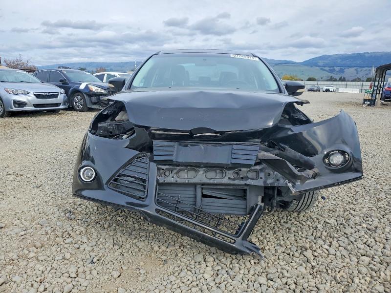 Photo 5 from auction – 2014 FORD FOCUS with VIN 1FADP3J25EL321655