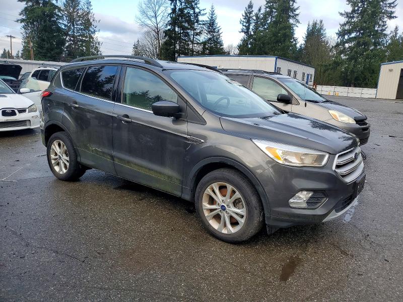 Photo 4 from auction – 2018 FORD ESCAPE SE with VIN 1FMCU9GD8JUD08120