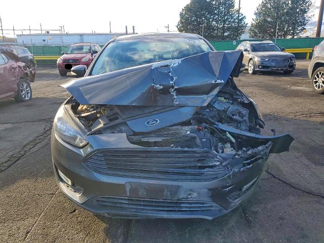Photo 5 from auction – 2017 FORD FOCUS with VIN 1FADP3FE0HL294193
