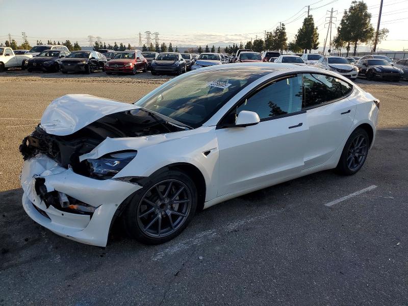TESLA MODEL 3 2022 with VIN 5YJ3E1EA3NF156211 - Photo from auction