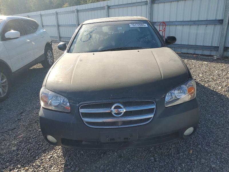Photo 5 from auction – 2002 NISSAN MAXIMA with VIN JN1DA31A02T302156