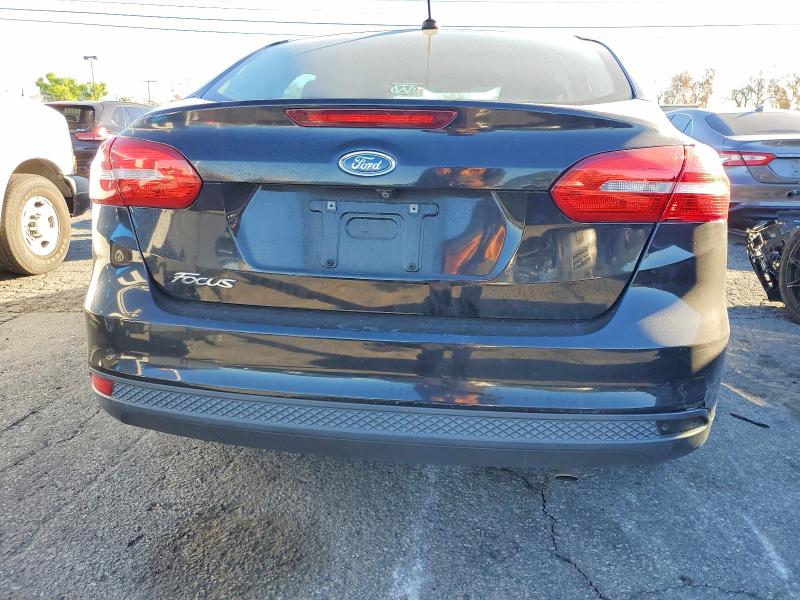 Photo 6 from auction – 2016 FORD FOCUS S with VIN 1FADP3E21GL268143