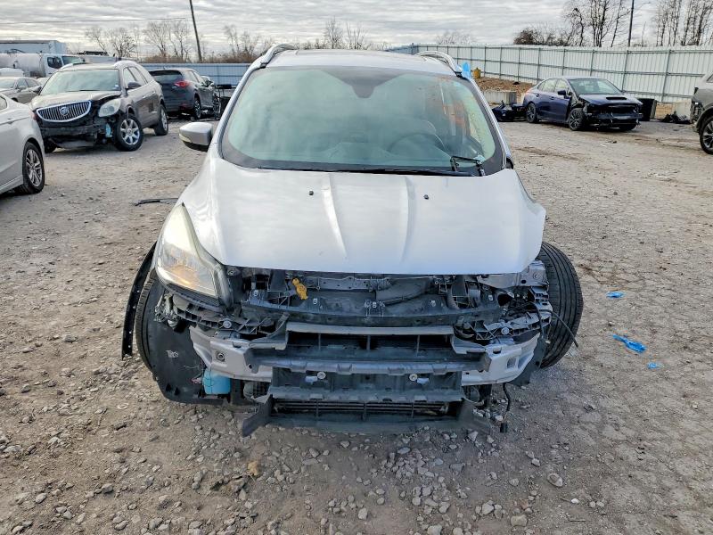 Photo 5 from auction – 2015 FORD ESCAPE TIT with VIN 1FMCU9J99FUC66651