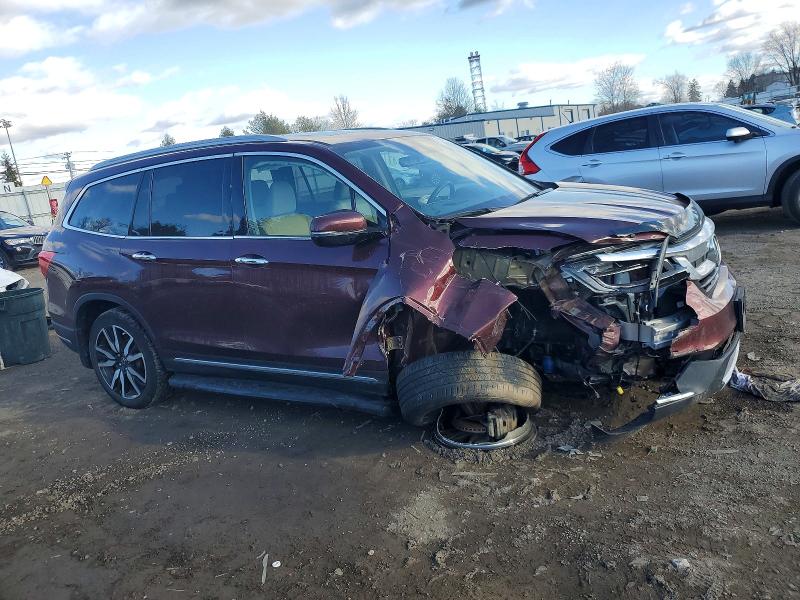 Photo 4 from auction – 2021 HONDA PILOT TOUR with VIN 5FNYF6H60MB036680