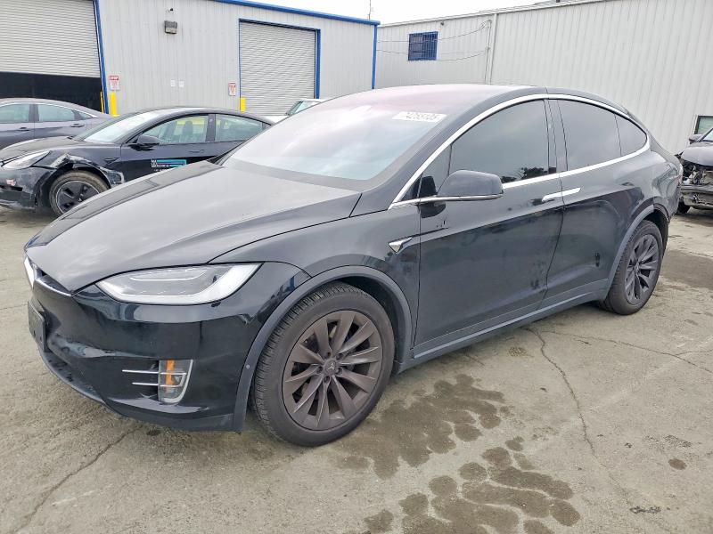 TESLA MODEL X 2019 with VIN 5YJXCAE20KF182860 - Photo from auction