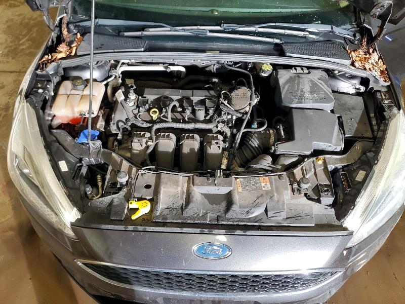 Photo 11 from auction – 2016 FORD FOCUS S with VIN 1FADP3E26GL273693