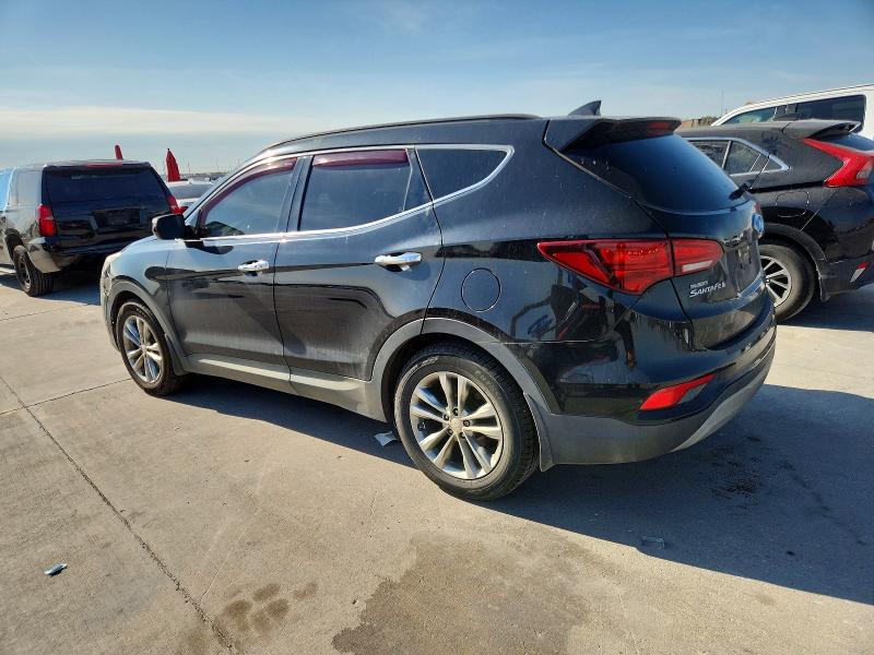 Photo 2 from auction – 2018 HYUNDAI SANTA FE S with VIN 5NMZU4LA6JH096337