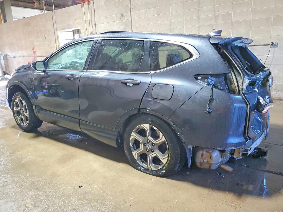 Photo 2 from auction – 2017 HONDA CR-V with VIN 5J6RW2H81HL023898