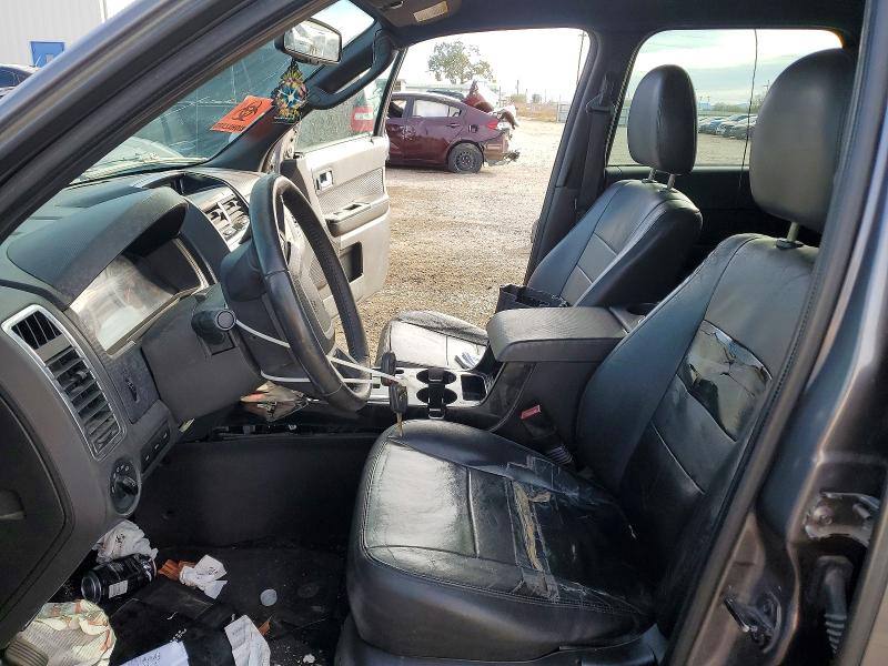 Photo 7 from auction – 2011 FORD ESCAPE LIM with VIN 1FMCU0E73BKB04119