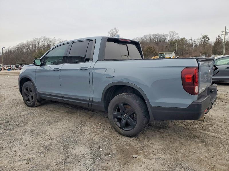 Photo 2 from auction – 2022 HONDA RIDGELINE with VIN 5FPYK3F84NB035944