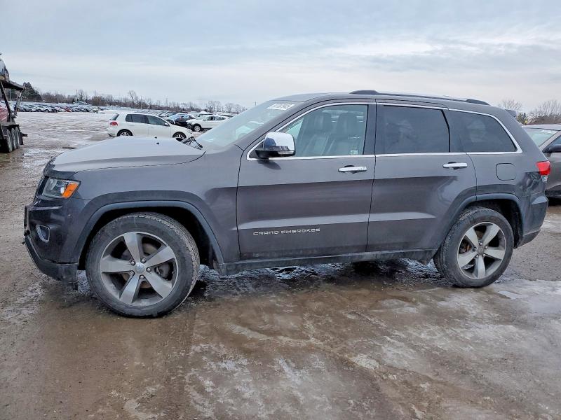 JEEP GRAND CHER 2014 with VIN 1C4RJFBGXEC419092 - Photo from auction