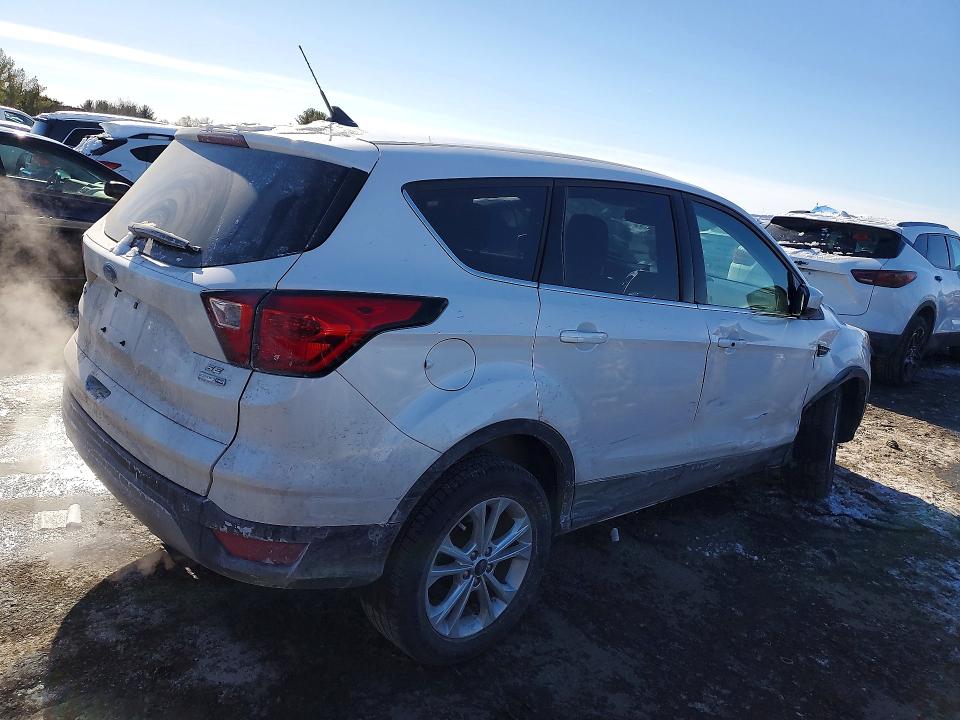 Photo 3 from auction – 2019 FORD ESCAPE with VIN 1FMCU9GD7KUA48875