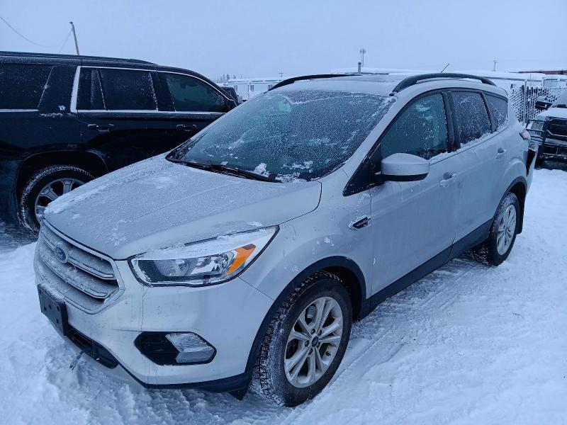 FORD ESCAPE SE 2018 with VIN 1FMCU9GD1JUC10420 - Photo from auction