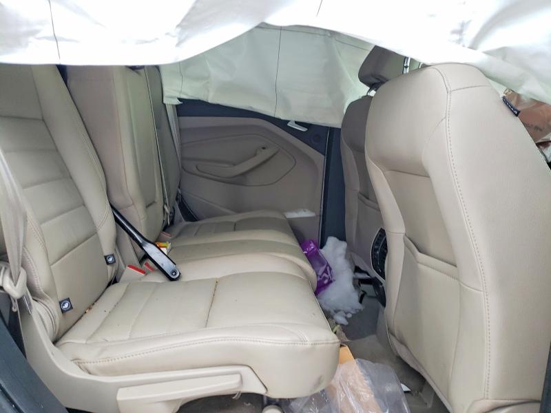Photo 11 from auction – 2016 FORD ESCAPE TIT with VIN 1FMCU9JXXGUA80052