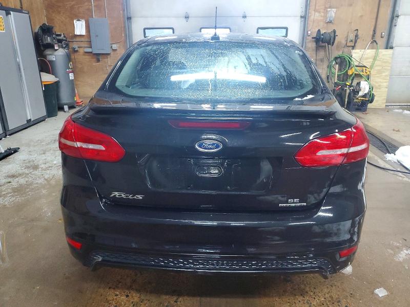 Photo 6 from auction – 2015 FORD FOCUS SE with VIN 1FADP3F29FL340218