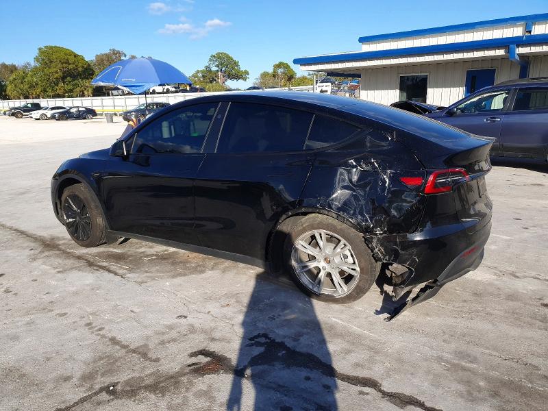 Photo 2 from auction – 2023 TESLA MODEL Y with VIN 7SAYGAEE0PF942010
