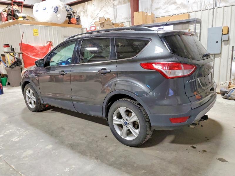 Photo 2 from auction – 2015 FORD ESCAPE SE with VIN 1FMCU9GX7FUA97347